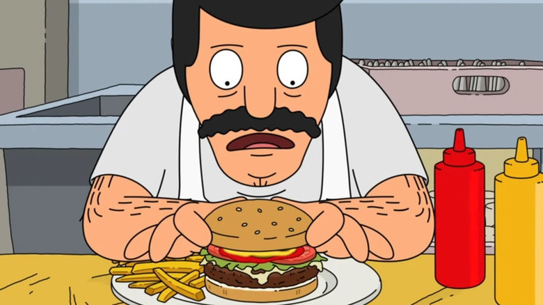 Bob from Bob's Burgers looking at a burger