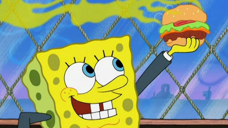 SpongeBob holding a Krabby Patty