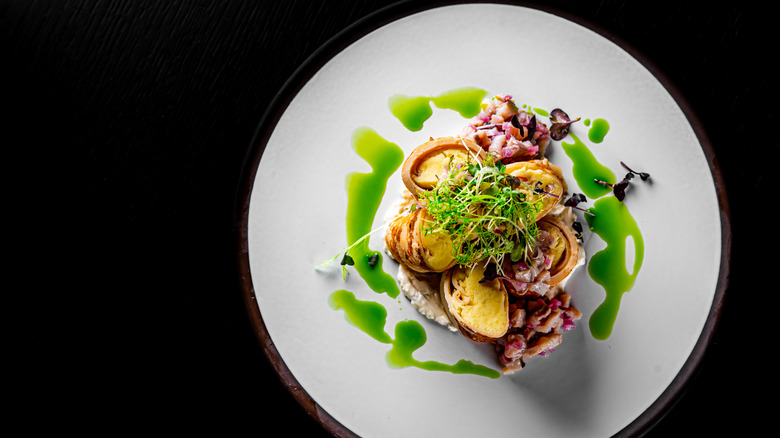 Large plate with fine dining food on it
