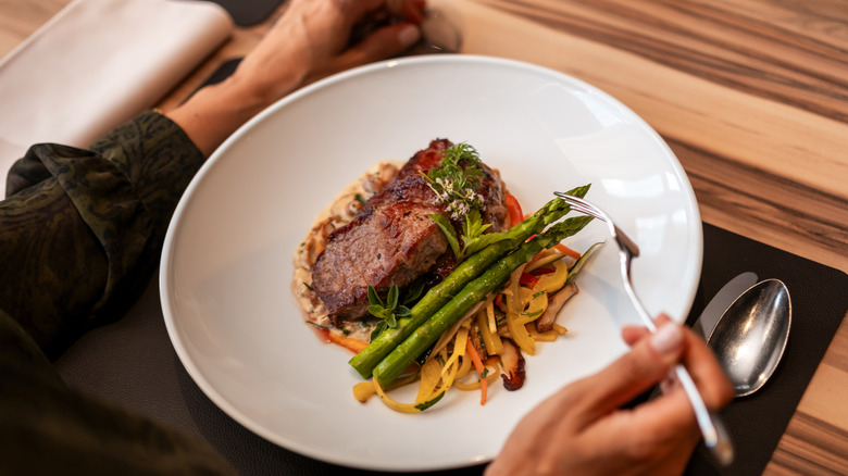Plate with large piece of steak