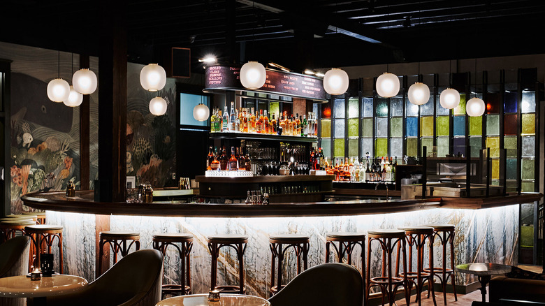 The vibrant bar area at Le Loup