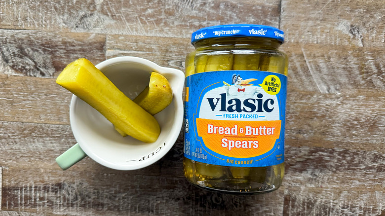 Vlasic pickle spears in a cup