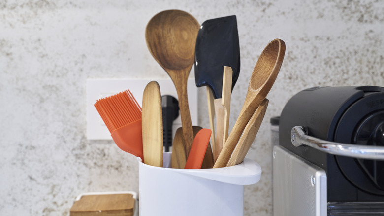 A close up of a kitchen utensil holder