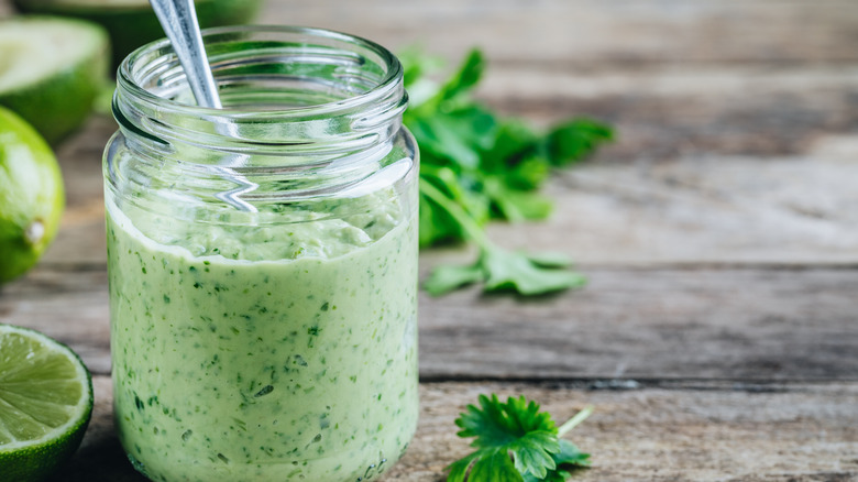 Avocado sauce in glass jar