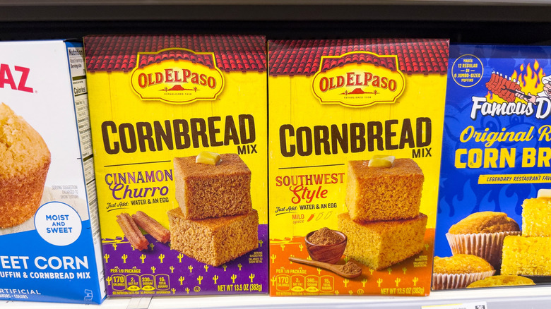 Boxes of cornbread mix on the shelf at a grocery store