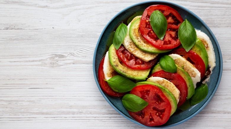 Avocado Caprese salad on plate