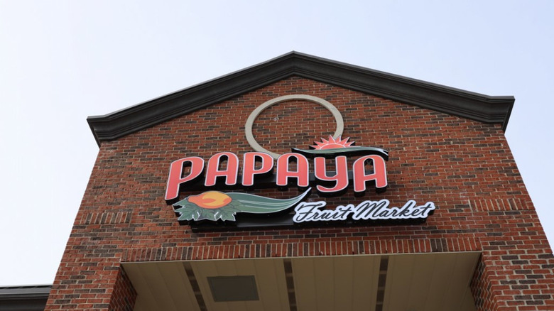 storefront of papaya fruit market
