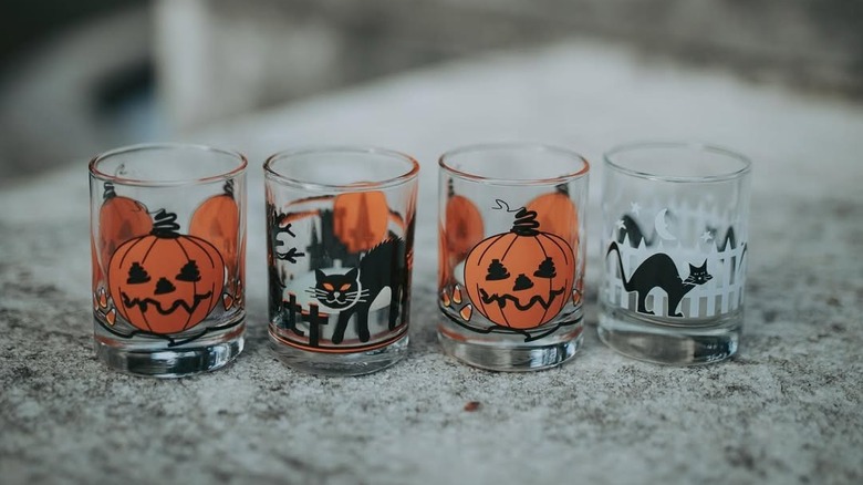 Set of four vintage Halloween candle holders