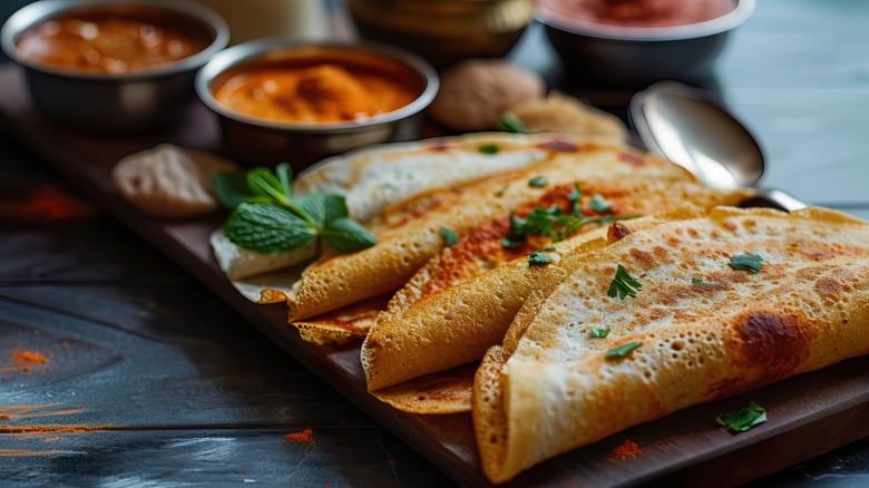 Dosas with pickles and chutney