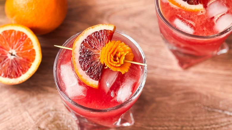 blood orange cocktails on wooden background