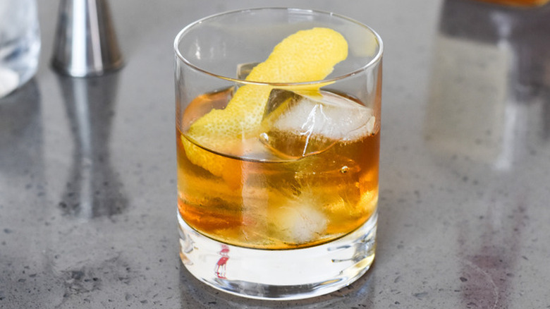 Old Fashioned cocktail on quartz countertop
