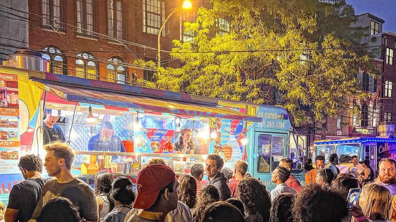 People buying eats at Philly food truck festival