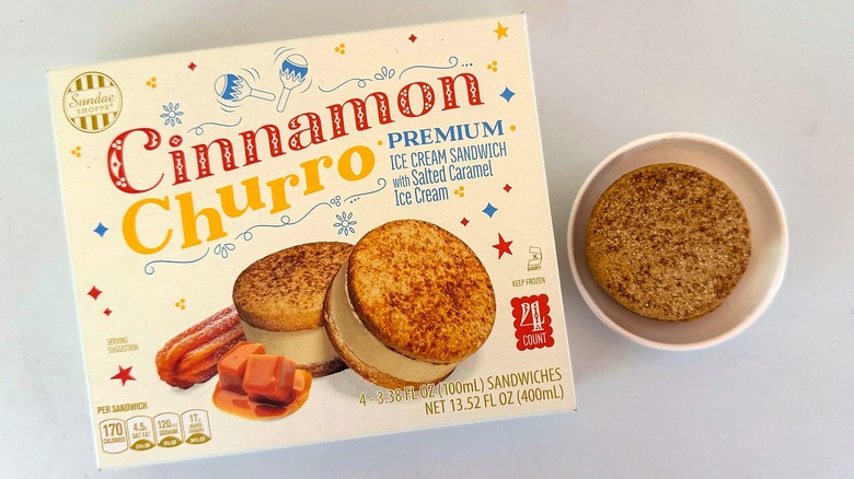 Box of Sundae Shoppe Cinnamon Churro Ice Cream Sandwiches beside one sandwich in small dish