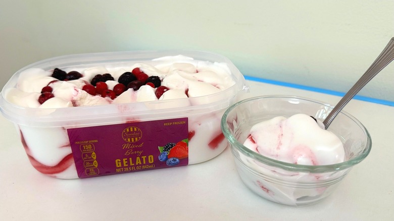 Tub of Sundae Shoppe Mixed Berry Gelato beside small filled bowl