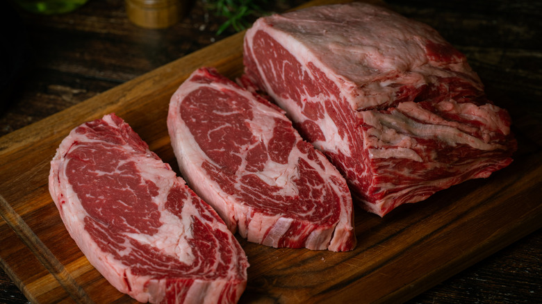 Ribeye steak on a wooden board
