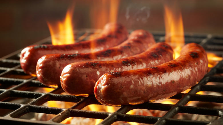 Grilled sausages with flame