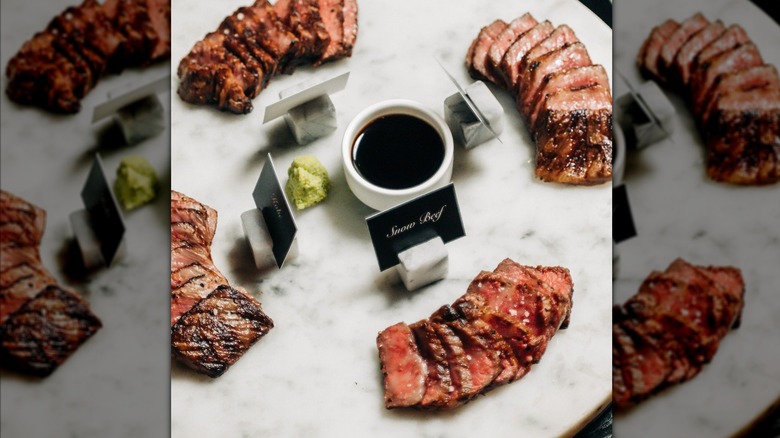 Platter of four different cuts of Wagyu from RPM Steak