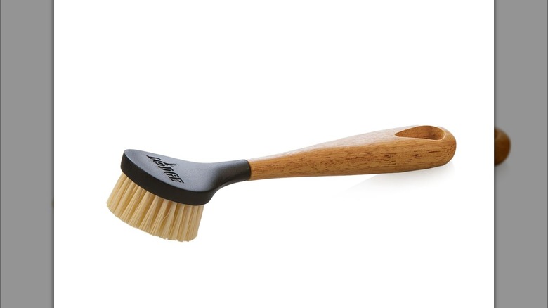 Lodge scrub brush on white surface