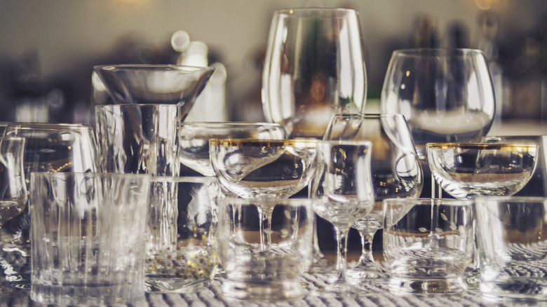 Assorted empty cocktail glasses