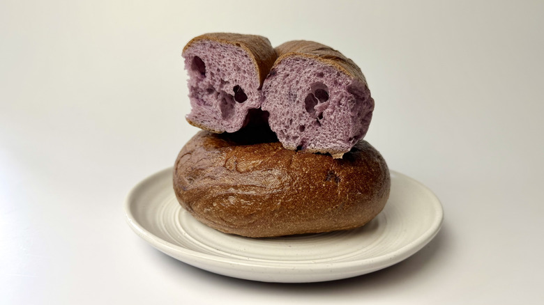 Market District bakery's blueberry bagel on a white plate