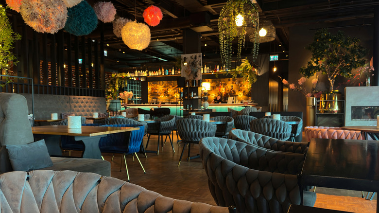 Moody, dark restaurant with low lighting