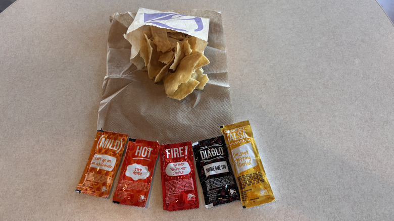bag of Taco Bell chips with salsa packets