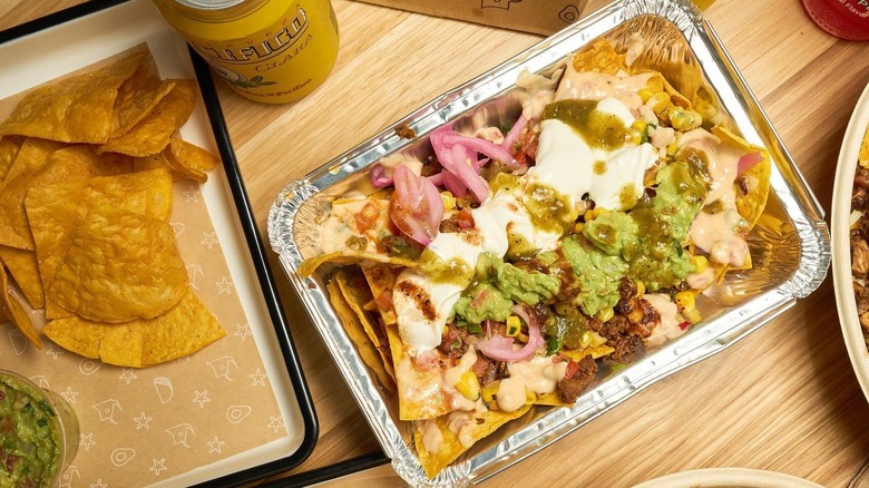 A tray of nachos at at Dos Toros Taqueria