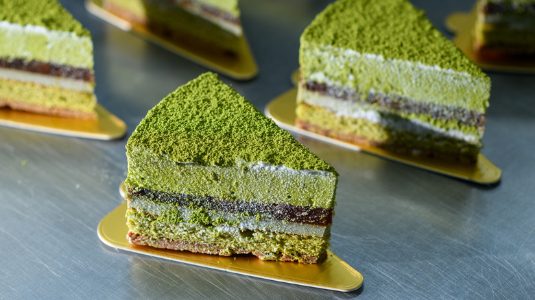 layered cake with matcha dusting