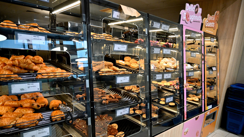 Lidl bakery cases in Wales showing pastries like croissants on trays