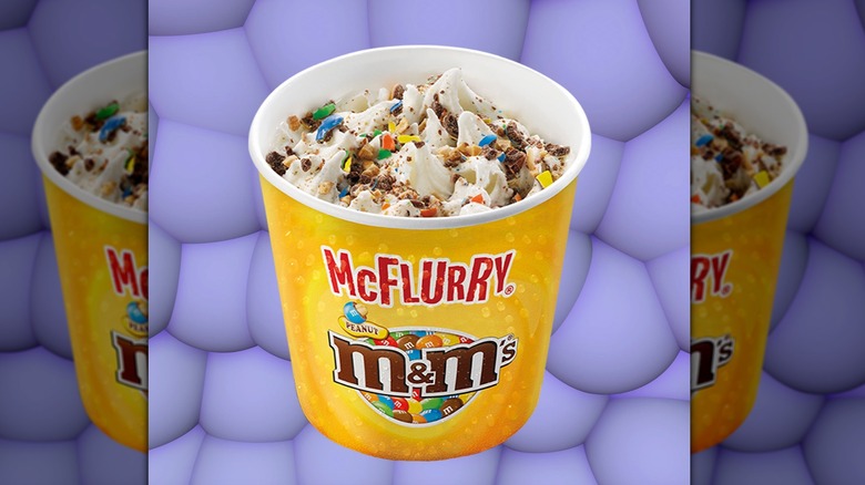 Peanut M&M's McFlurry on purple background