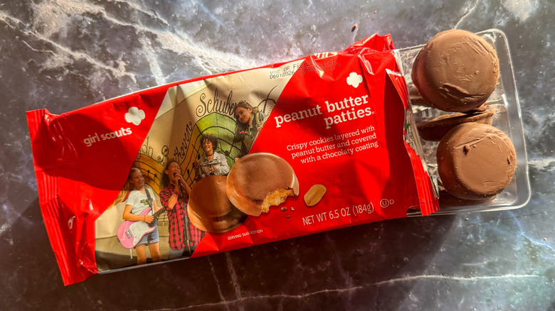 Peanut butter patties on a slate surface