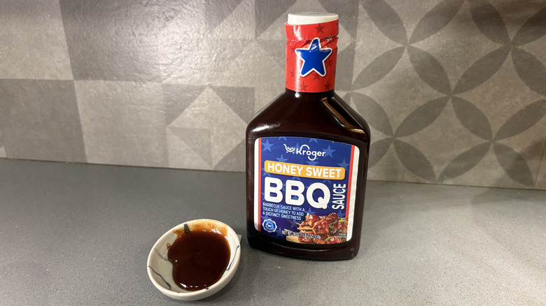 A bottle of Kroger Honey Sweet BBQ Sauce