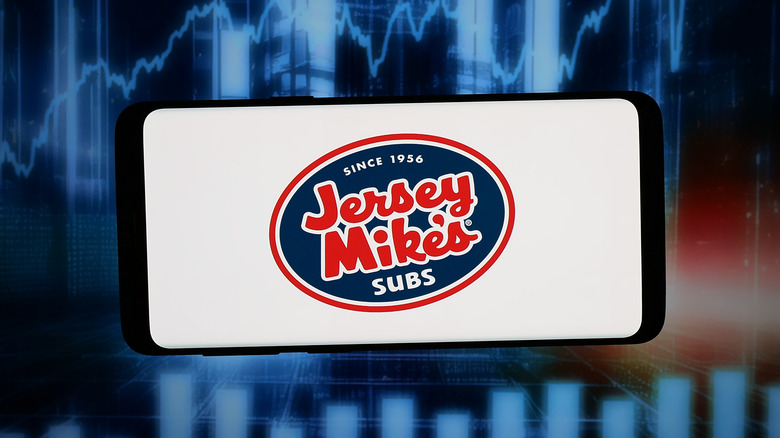 The Jersey Mike's Subs logo appears on a phone