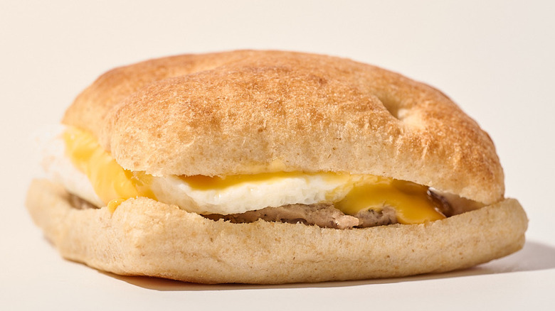 Ciabatta sausage sandwich on a table