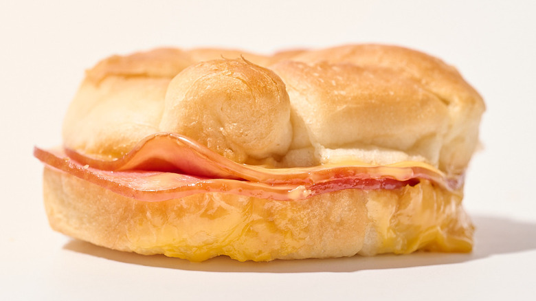 ham and cheese croissant on a table