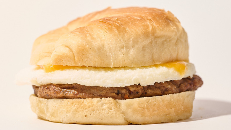 Sausage croissant sandwich on a table