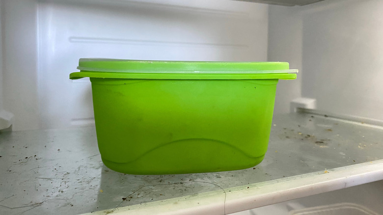 Plastic food storage container in a fridge