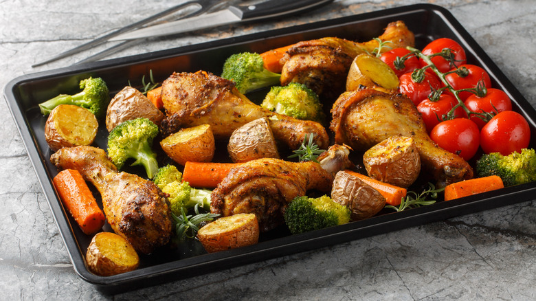 Baking sheet with chicken and vegetables