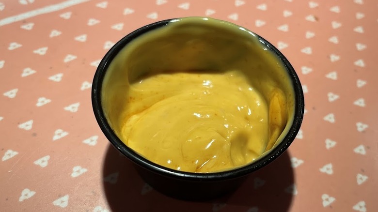 A cup of Lava Sauce
