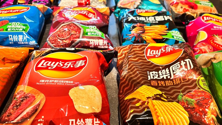 Bags of La'potato chips in rows