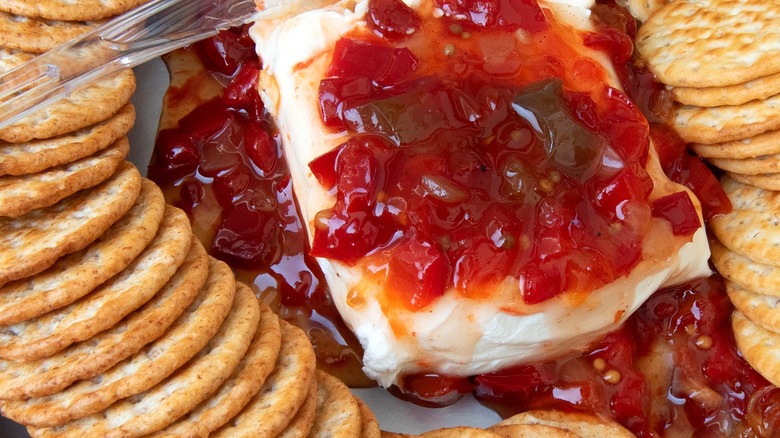 Pepper jelly cream cheese served with crackers