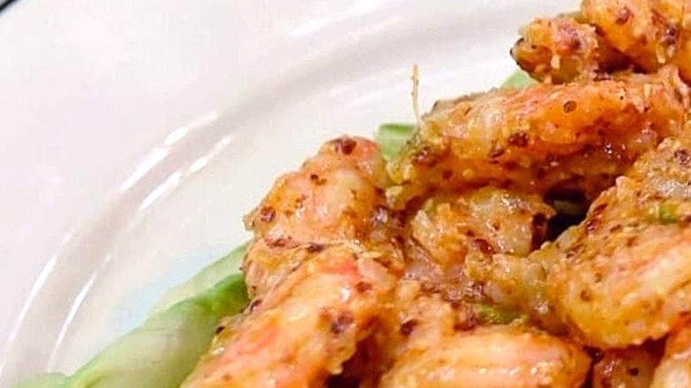 Close up of shrimp remoulade on iceberg lettuce