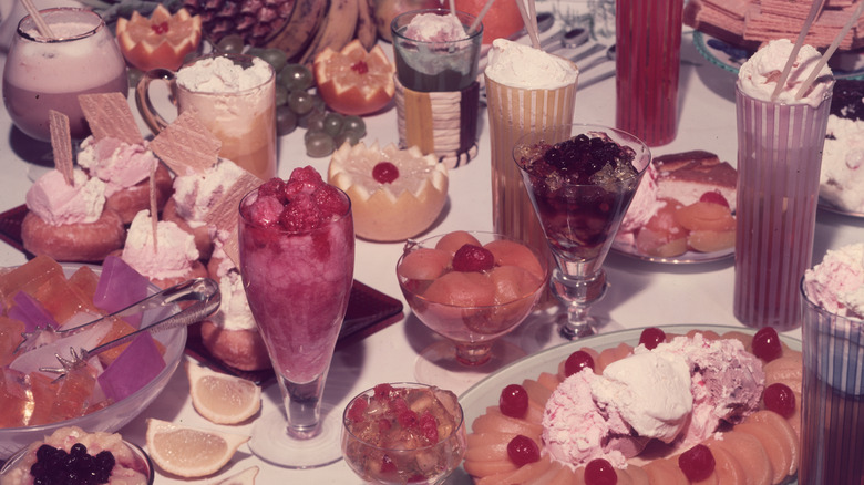 1960s food spread including cherries, Jell-O, and fruits