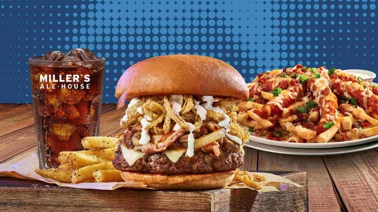 Soda, burger, and loaded fries from Miller's Ale House