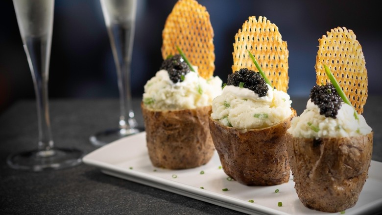 A plate of caviar-topped double baked potatoes at Eddie V's Prime Seafood