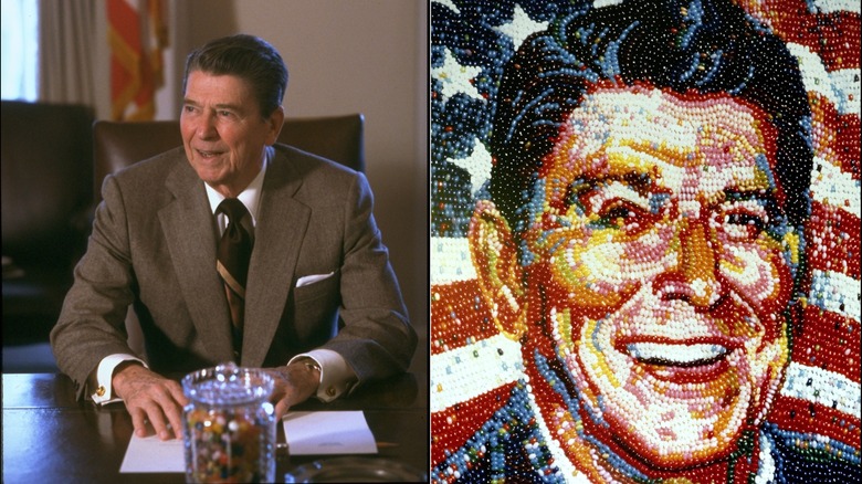 Ronald Reagan sits at a desk with a jar of jelly beans in front of him, and mosaic made of jelly beans depicting Reagan