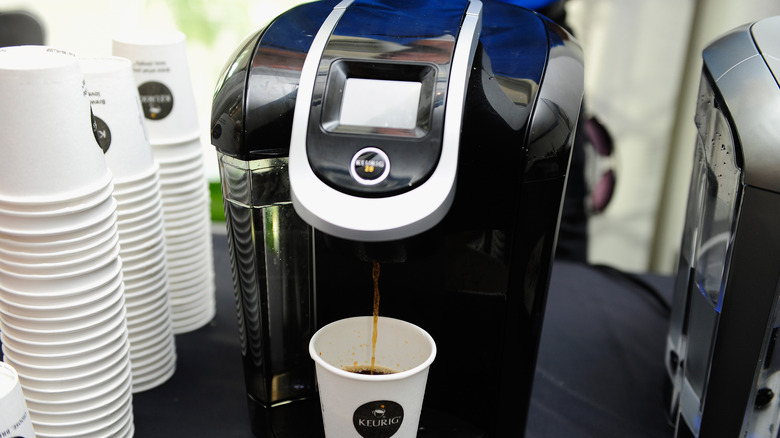 Keurig dispensing coffee