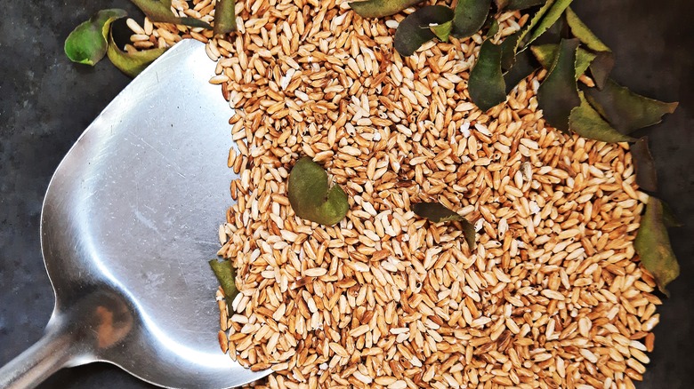 toasting rice in black pan