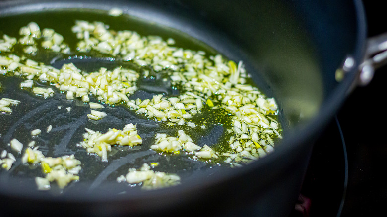 Cooking garlic in a pan