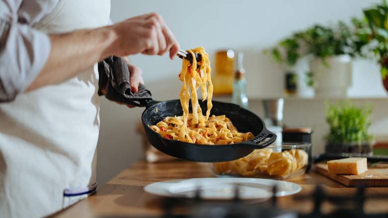 A person making pasta